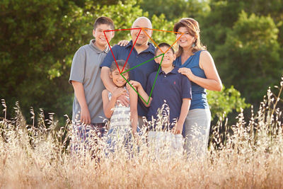 photo markup of family portrait in field