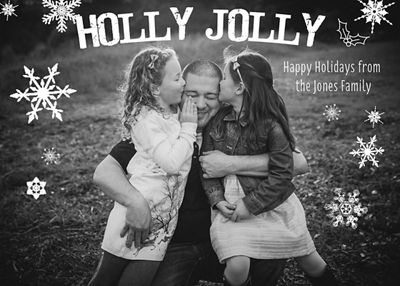black and white holiday card featuring dad and his 2 daughters