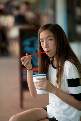 Laura's daughter eating a slushie