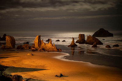 Bandon beach illuminated at night