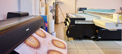 Image of large format printers in use