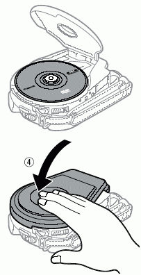 Loading a disc into the DC10 or DC20 DVD camcorders