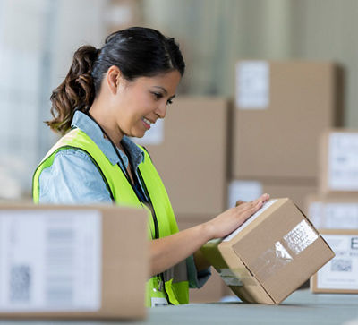 Image of a woman holding a package