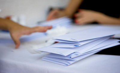 image of mail being sorted