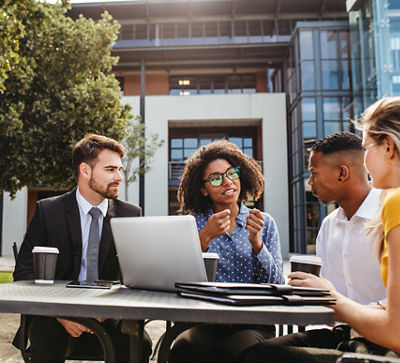 image of a group talking at a table