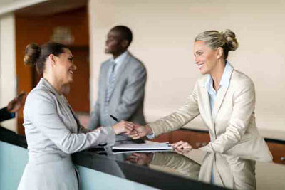 Business professionals shaking hands