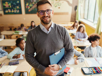 Teacher in a classroom full of childern