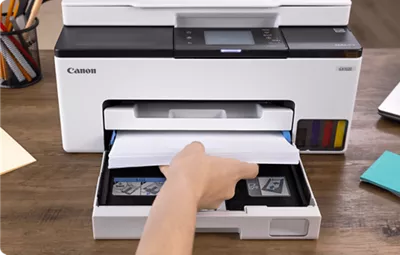 MAXIFY GX1020 - Person Filling Paper Cassette