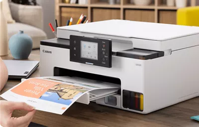 MAXIFY GX1020 - Person Grabbing Printed Paper