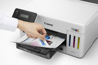 MAXIFY GX5120 - Person Grabbing Printed Paper