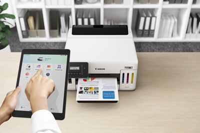 MAXIFY GX5120 - Person Using Tablet to Print