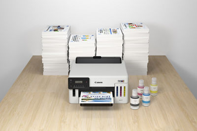 MAXIFY GX5120 - In Between a Stack of Papers and Ink Bottles