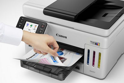 MAXIFY GX6110 - Person Grabbing Printed Paper