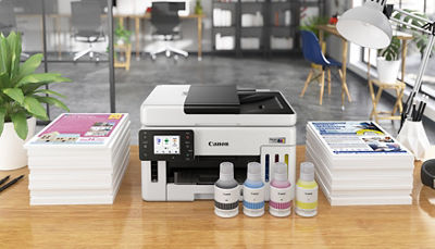 MAXIFY GX6110 - In Between a Stack of Papers and Ink Bottles