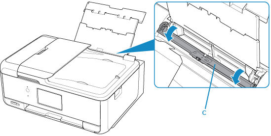 Feed slot cover opened