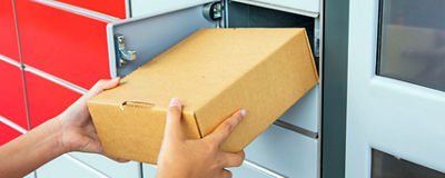 Image of a package being put in a locker