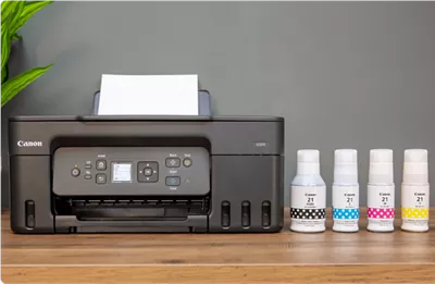PIXMA G3270 - Printer next to Ink Bottles