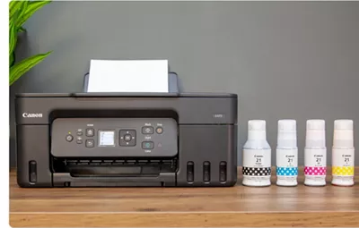 PIXMA G3272 - Printer next to Ink Bottles