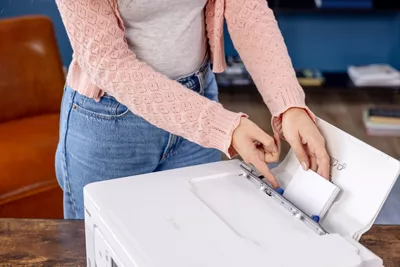 PIXMA G3290 - Person Loading Small Papers to Printer