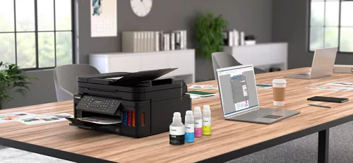 Printer and Inks on an office table
