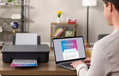 PIXMA TS302a - Person Printing from a Laptop