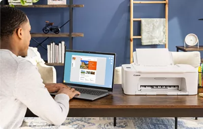 PIXMA TS3720 - Person Printing from Laptop