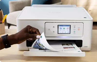 PIXMA TS7722 - Person Retrieving a Two-Sided Print