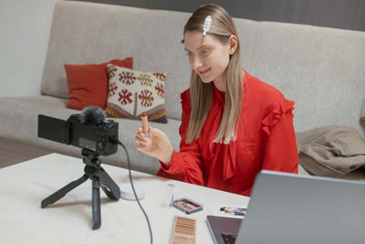 Person Using PowerShot V1 to Record Themselves