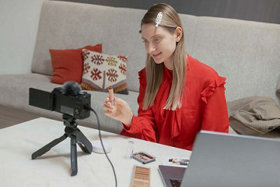 Person Using PowerShot V1 to Record Themselves