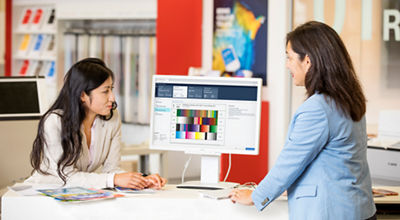 image of two women working with PRISMA software