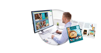 Guy at computer with brochures