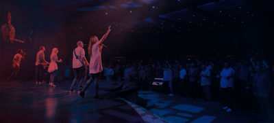 Woman singing to the crowd