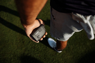 Person Holding PowerShot GOLF