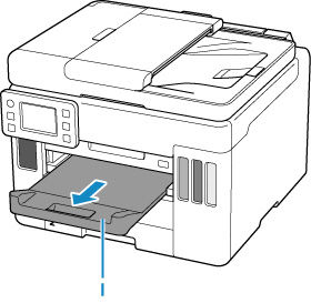 Pull out the paper output tray (I)