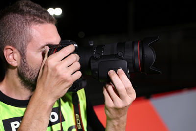 Power Zoom Adapter PZ-E2 - Photographer Using It