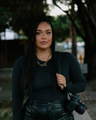 Man holding Canon EOS R5