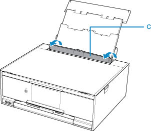 Feed slot cover (C) open