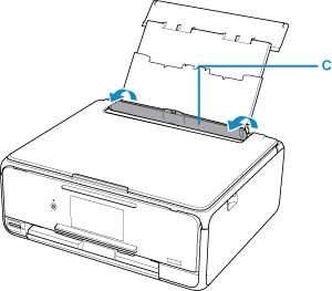 Printer viewed from the front with the feed slot cover for the rear tray opened