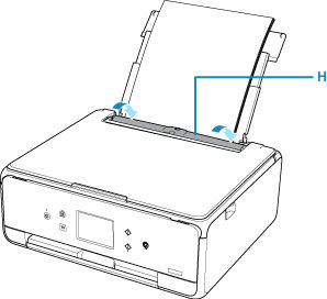 Feed slot covers shown in open position