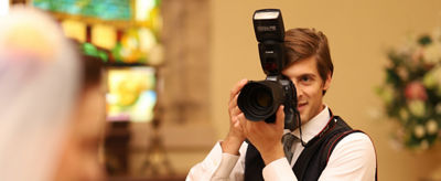 Photographer wearing a vest