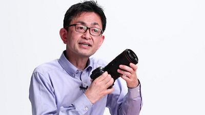 Ietsuka Kengo - Product Planner Holding a Camera