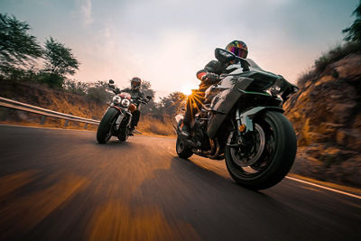 Motorcyclists Riding Motorcycles