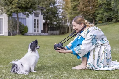 Person Using RF-S3.9mm F3.5 STM to Take Picture of a Dog