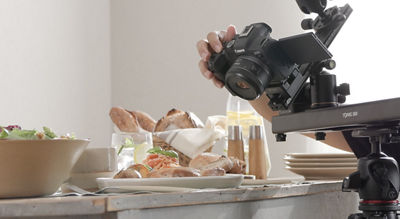 Person Taking a Picture of Food