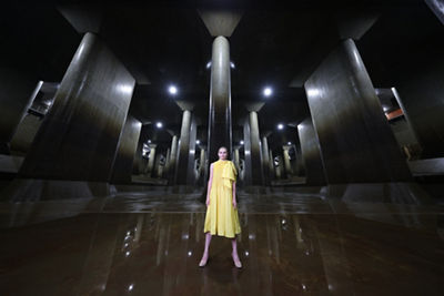 Person Standing in a Cool Geometric Room