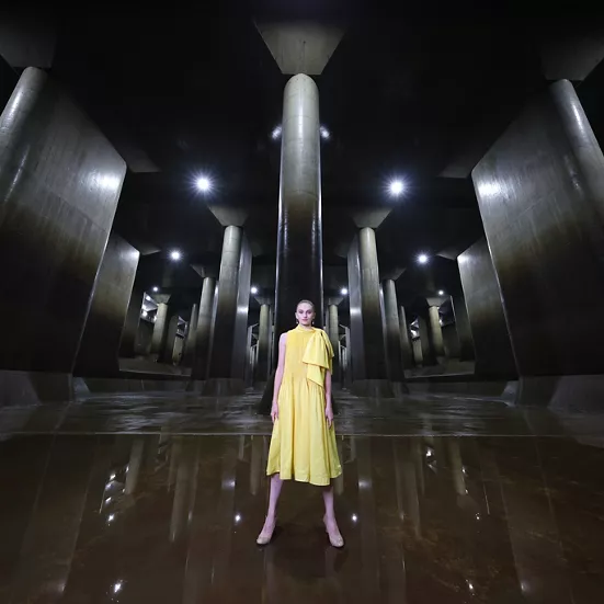 Person Standing in a Cool Geometric Room