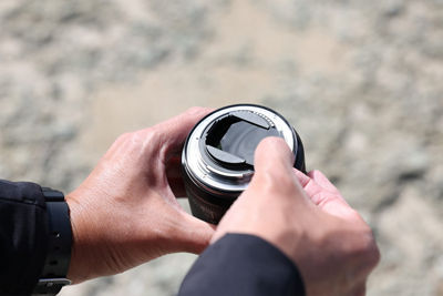 Person Putting on a Filter on Their Lens