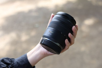 Person Holding the RF16-28mm F2.8 IS STM
