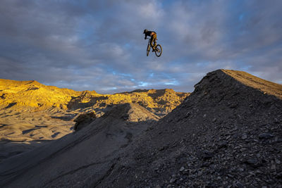 Biker Jumping On Hills