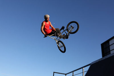 Person Doing a Trick on a Bike 